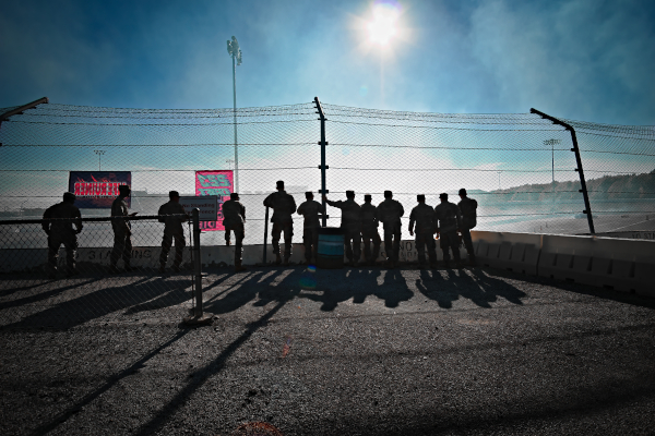 Soldiers Standing at Track